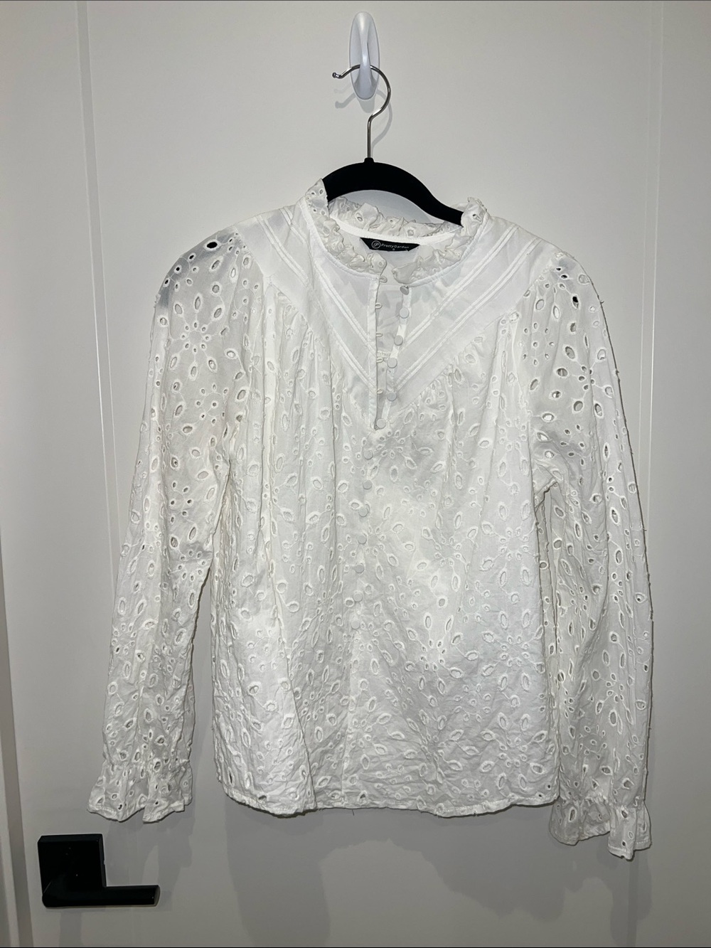 White eyelet shirt
